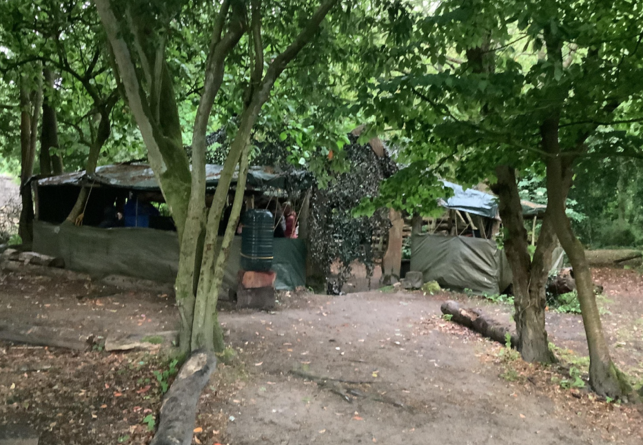 A picture of the shelter that surrounds the campfire