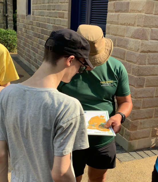 Two people looking at an orienteering map
